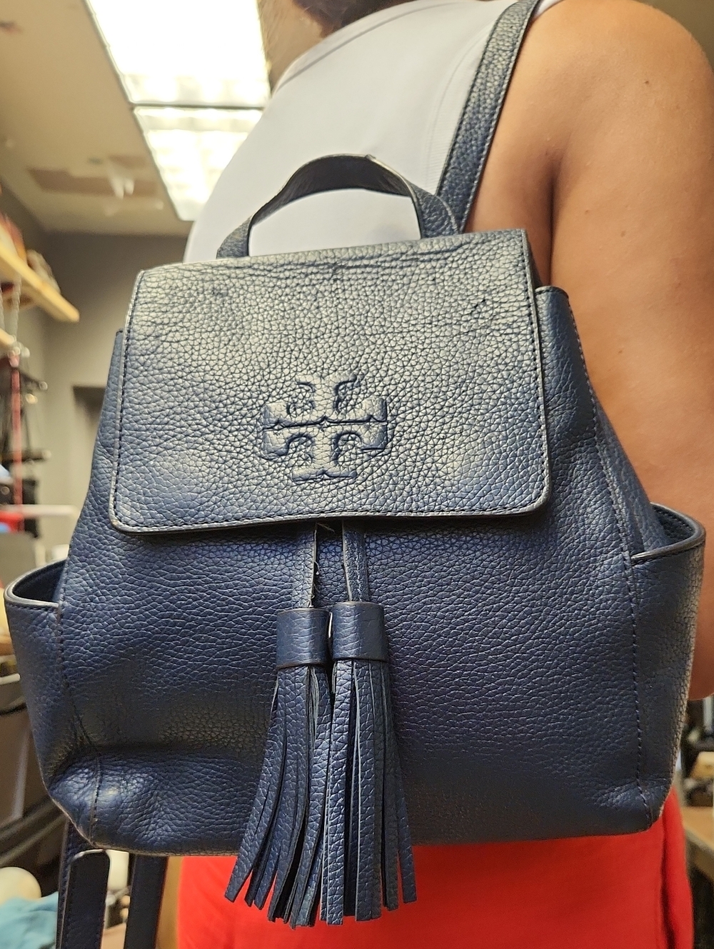 Tory Burch Navy Pebbled Leather Tassel Backpack